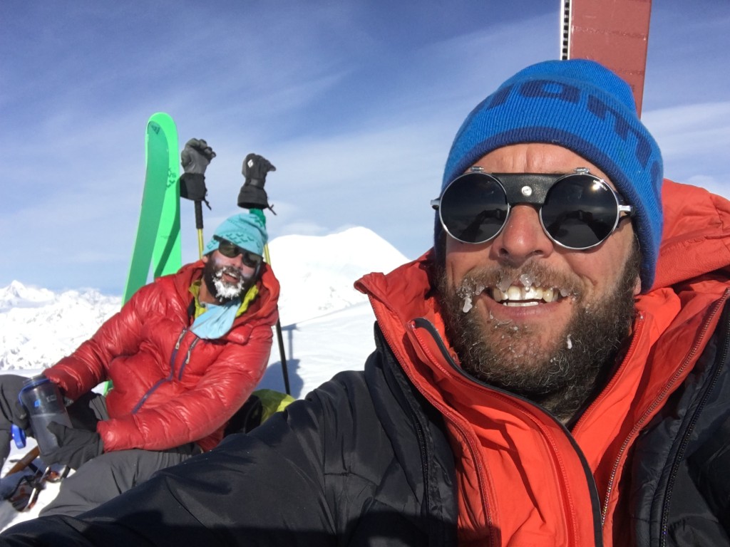 Taking a quick break on the summit to drink frozen water and rock hard bagels